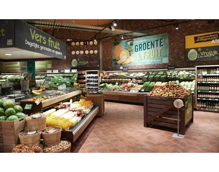 Studio Königshausen's retail design for Jumbo Supermarket in Breda, The Netherlands, aims to enhance the food shopping experience. Jumbo, a family-owned supermarket chain, wanted to elevate food preparation and enjoyment in their stores while maintaining affordability and convenience.